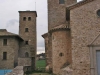 A l\'esquerra veiem la torre del Mas La Garriga. A la dreta l\'església de Sant Joan de Bergús.