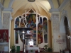 Església de Sant Iscle i Santa Victòria – Bàscara - Fotografia obtinguda adossant l'objectiu de la màquina de fotografiar al vidre de la porta d'entrada.
