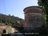 Església de Sant Joan Sesrovires. Al fons de la fotografia, apareix el Castell de Subirats.