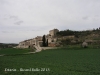 Estaràs - A mitja alçada de la fotografia apareix el campanar de l\'església de Sant Julià - Al fons, la poderosa mola del castell d\'Estaràs.