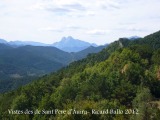 Vistes des de l'església de Sant Pere d'Aüira. En darrer terme, el Pedraforca.