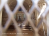 Vistes de l'interior de l'Església de Sant Pere de Montcalb – Guixers. Foto obtinguda introduint l'objectiu de la càmera a través de la petita obertura disposada a la porta d'entrada. Com es pot comprovar, a continuació hi ha un petit reixat.