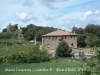 Masia Casanova – Castellar de la Ribera - Al fons de la fotografia apareix l'església de Sant Andreu de Clarà